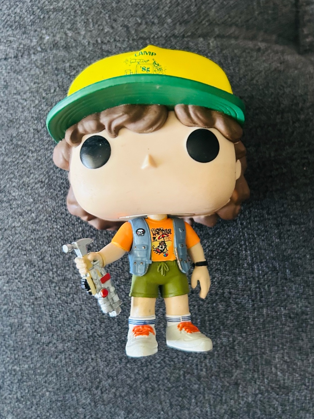 Funko Dustin Figure with Yellow/Green/Orange Outfit
